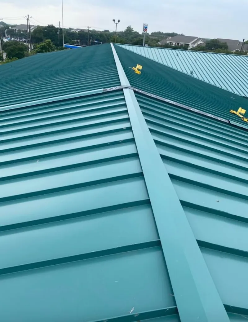Green commercial metal roof ridge and valley for Metal Roof Repair in Kaser