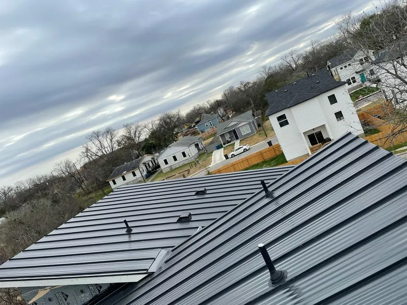 Standing seam metal roof panels with vents for Skylight Repair in Kaser